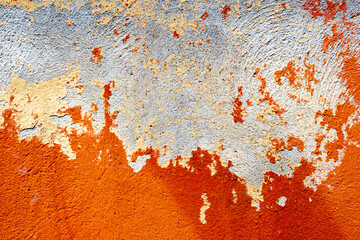 Cream and rust color concrete wall grunge background texture