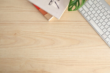 books and keyboard on the table