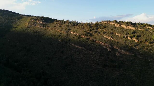 Sandia Crest And Surrounded Forest Mountains Illuminated By Sunlight In New Mexico, USA. Aerial Drone Shot