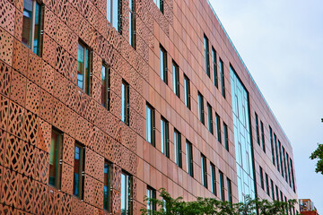 Artistic building exterior with metal cutouts and windows