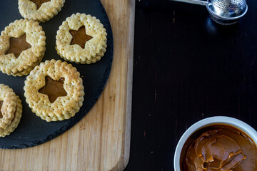 Linzer cookies, Delicious Christmas cookie with handmade star-shaped candies
