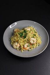 Shrimp Seafood Pasta Spaghetti Noodles with Parsley and Red Chili