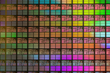 Semiconductor wafer with multiple dies and diffraction lighting shimmering rainbow of colors