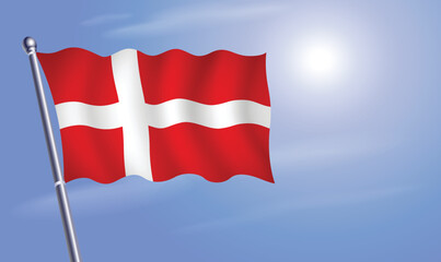 Denmark flag against a blue sky