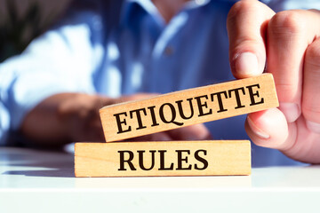 Wooden blocks with words 'Etiquette Rules'.