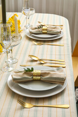 Festive table setting with floral decor