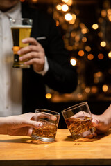 Celebrate whiskey a friendly party in restaurant.