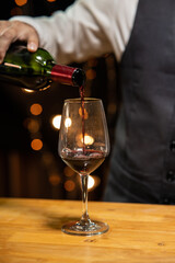 Barman pouring whiskey whiskey glass beautiful night