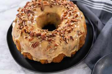 Chocolate pumpkin bundt cake with toffee glaze