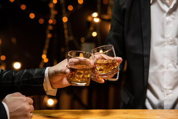 Barman pouring whiskey whiskey glass beautiful night