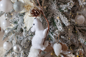 Christmas tree in classic colors with toys. Close-up.