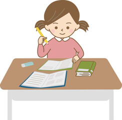 問題集を広げて、ノートに勉強をする女の子