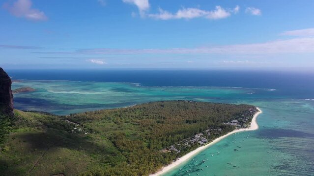 aerial video view of Mauritius island with famous Le Morne Brabant mountain, beautiful beach, blue lagoon and landscape around the UNESCO World Heritage Site, K4 video footage 