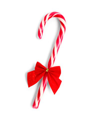 Sweet candy cane with Christmas bow isolated on white background