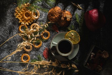 Food table top- cup of hot coffee. Still life- dark background