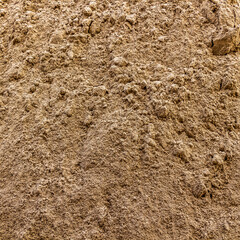 Construction river sand closeup as a background.