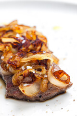 steak covered by caramelized onion