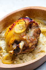 pork knee baked with onion
