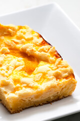 apricot cake on the white plate