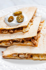 quesadilla with chicken meat and jalapenos