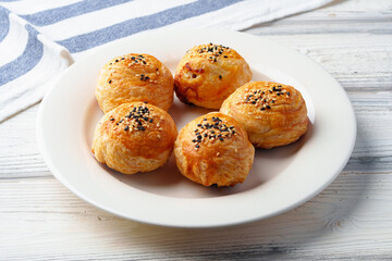 Homemade turkish piesl pogaca with sesame seeds