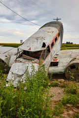 Vertical view of airplane crashed and abandoned in fields