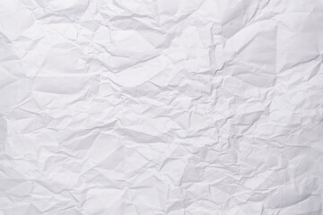 White crumpled paper texture background, clean white wrinkled paper, top view.