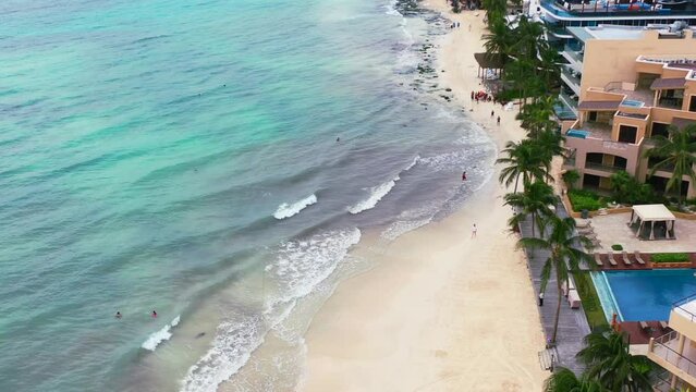 turquoise blue ocean shoreline of Playa Del Carmen Beach in Mexico, aerial