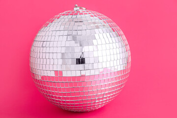 Disco ball on pink background