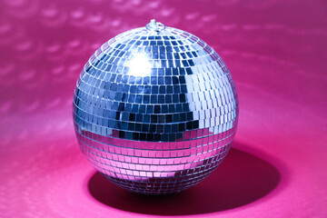 Disco ball on pink background