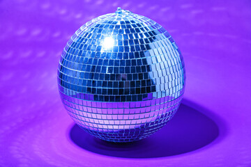 Disco ball on purple background