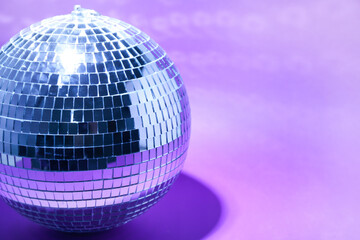 Disco ball on purple background