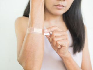 Bandage on Hand Close Up,Woman Injured Painful to Hand,Little Wounded on Body,People First aid Treated,Medical Health Hospital Doctor,Plaster Care Pain,Authentic Black Hair and Skin Tan Asian Thailand
