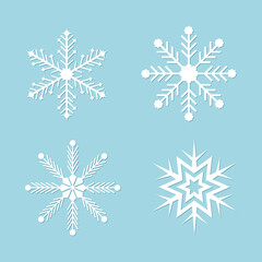 Snowflake icon vector isolated on blue background