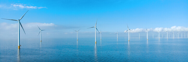 Renewable energy Windmill park with windmills turbines in the ocean