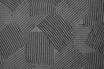 Fototapeta premium grey background, grey wall and grey decorative plaster in the photo