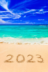 Fototapeta na wymiar Numbers 2023 on beach