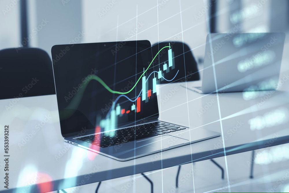 Poster close up of laptop on desktop with glowing business forex chart hologram and grid on blurry backgrou
