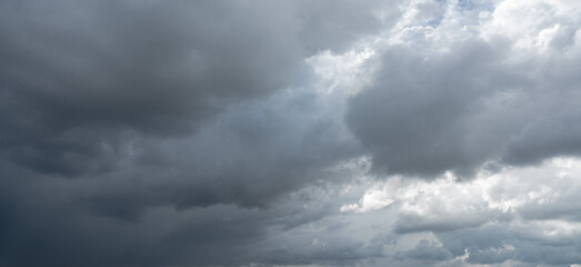 Overcast sky. Dramatic gray sky and dark clouds before rain in rainy season. Cloudy and moody sky. Storm sky. Gloomy and moody background. Overcast clouds. Sad, lonely, and death abstract background.