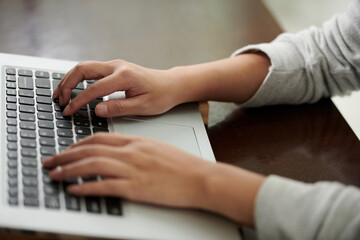 Hands of Woman Typing on Keyboard