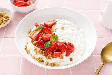 Yogurt with strawberry. Plain white greek yogurt with fresh berries and granola. Healthy food, breakfast. Top view