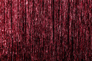 Metallic pink, red, magenta color foil tinsel fringe decoration curtain. Birthday, wedding,...