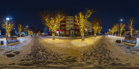 full spherical night 360 panorama in festively lit on pedestrian street with trees decorated with...