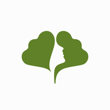 ginko leaf woman face negative space logo symbol