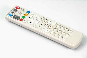 white versatile television remote on a white background