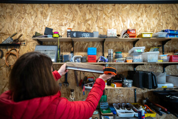 female builder in her home workshop in america