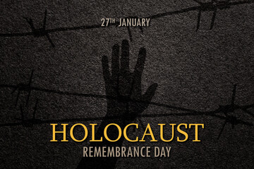 International Holocaust Remembrance Day. January 27. silhouette of hand with barber wire on black textured background. Poster or banner design.
