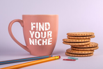 Find Your Niche. Coffee mug with text, white background