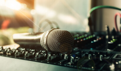 Close-up microphone and sound mixer in studio for sound record control system and audio equipment and music instrument. high quality dynamic microphone connect with male xlr connector.