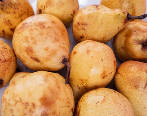 Food in the market - ripe pears.